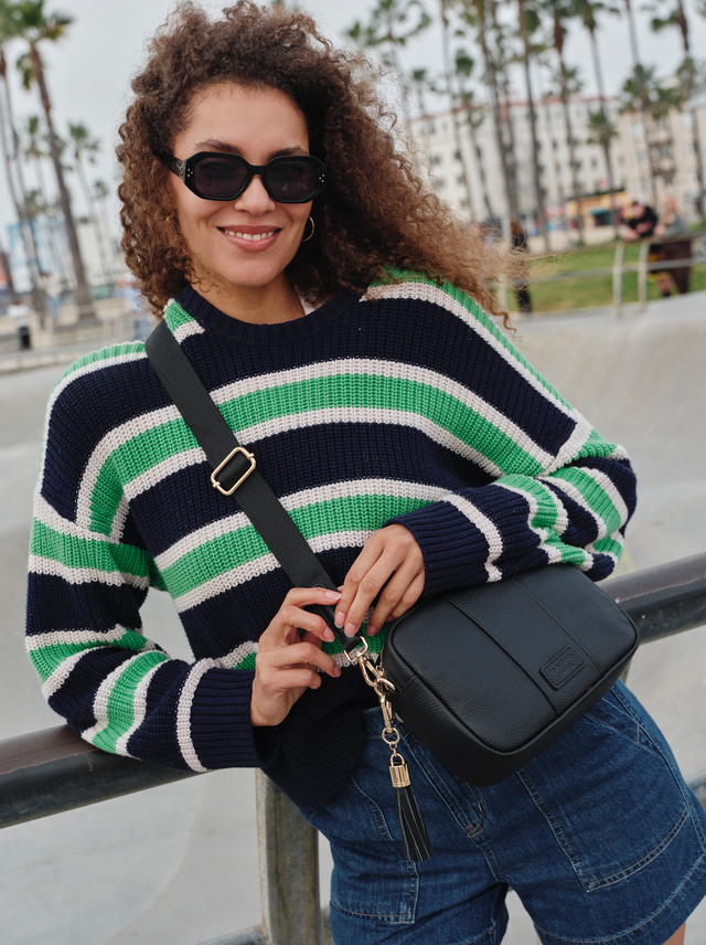 Pom Pom London City crossbody bag in Black worn across the body