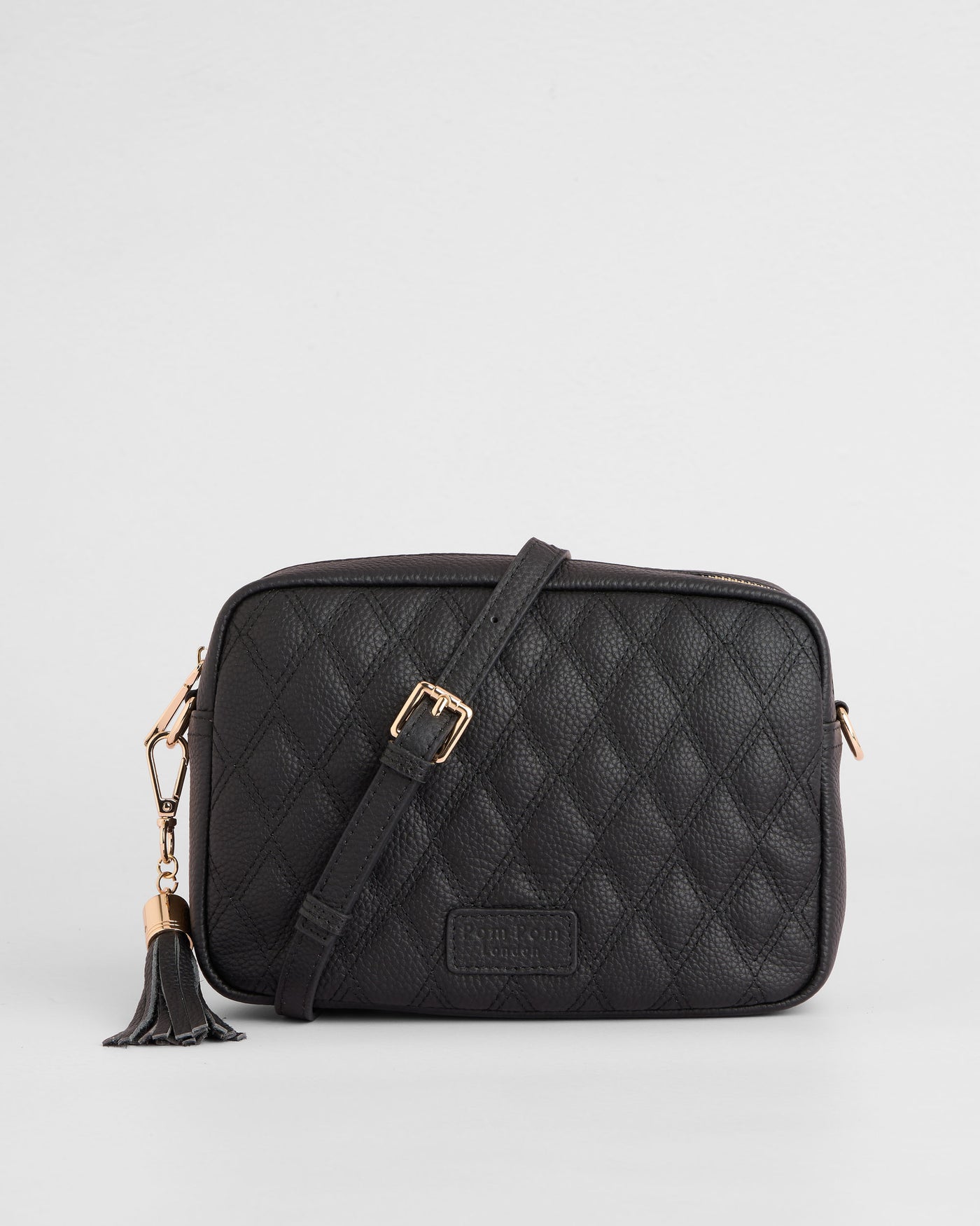 City Leather Crossbody Bag in Diamond Quilted Black | Pom Pom London