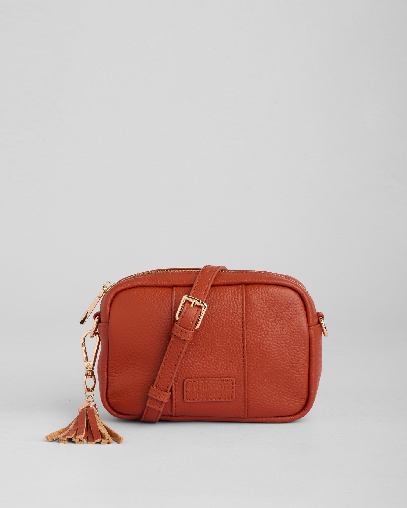 City Mini Leather Crossbody Bag in Burnt Orange | Pom Pom London