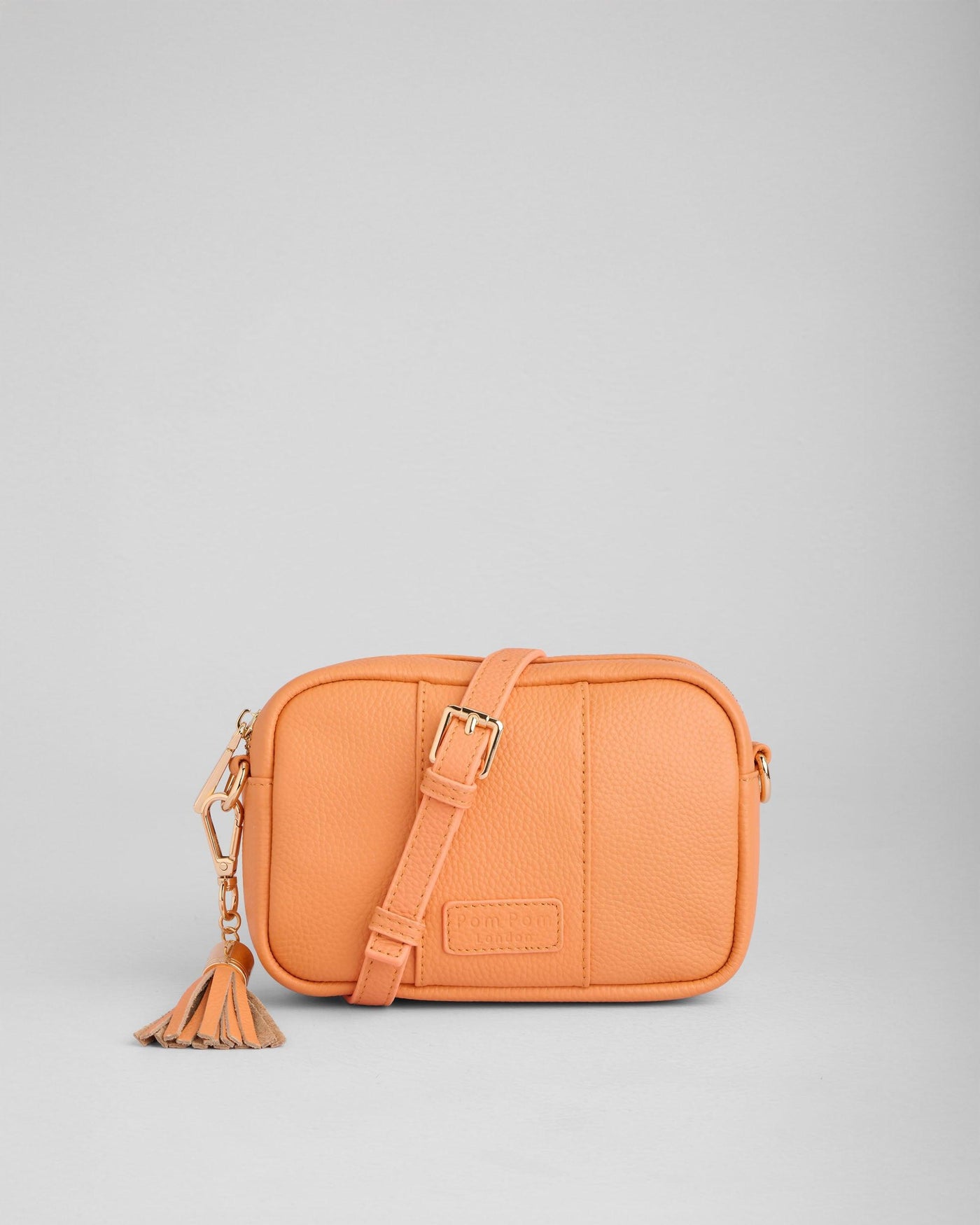 ALD1 仁川 ペンコン MD ミニポーチバッグ サンウォン City Mini Leather Crossbody Bag in Mango Tango | Pom Pom London