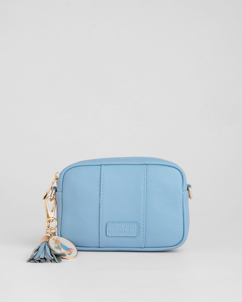 City Mini Crossbody Bag Peter Rabbit™ Blue-Pom Pom London