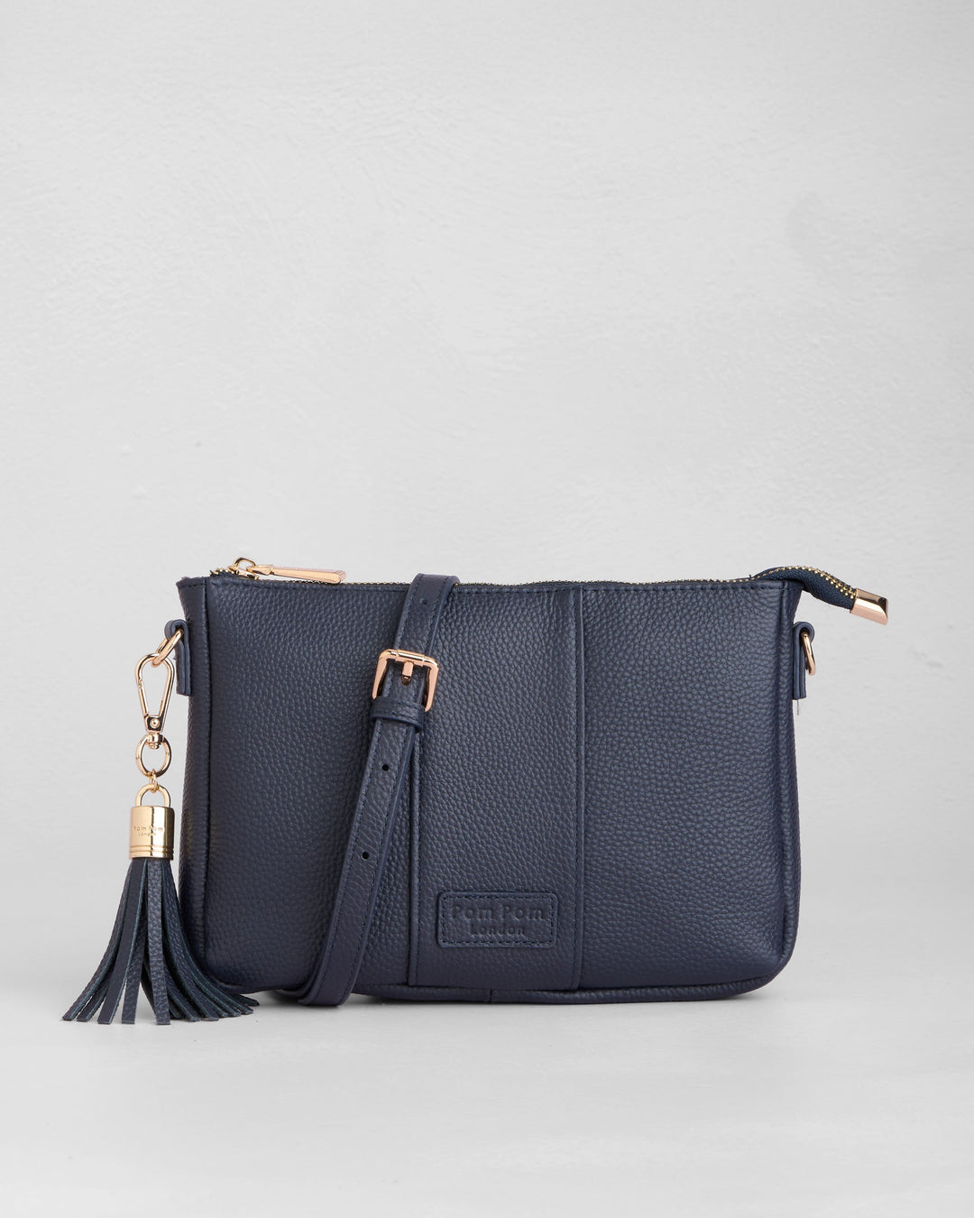 ボンポワン　レザーバッグ　ネイビー Pom Pom London City Slim Bag - Leather Crossbody bag in Navy