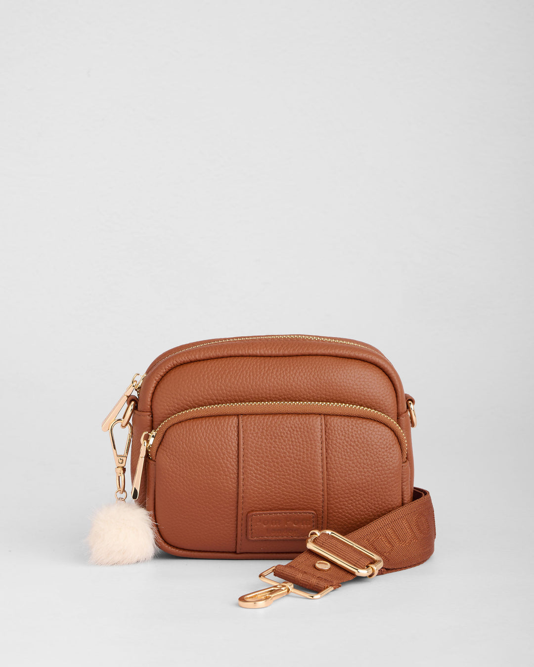 Original Mini Leather Crossbody Bag in Chestnut | Pom Pom London
