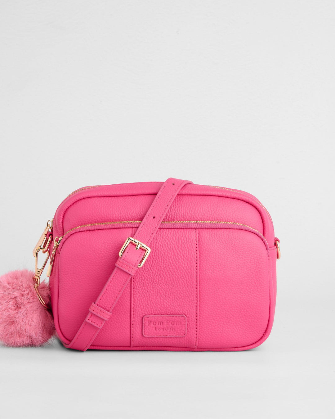 ピンク ボトル型ハンドバッグ Original Plus Leather Crossbody Bag in Azalea Pink | Pom Pom London
