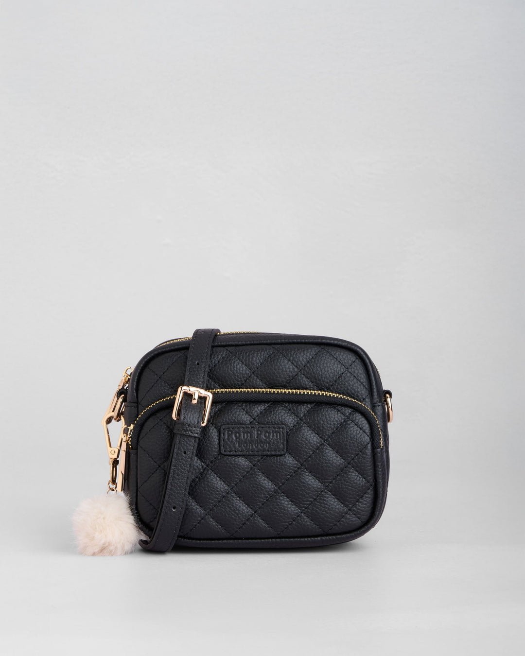 Original Mini - Quilted Leather Crossbody Bag In Black – Pom Pom